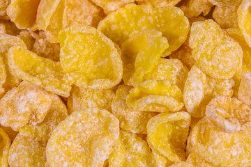 Background of the many yellow cornflakes. Healthy eating