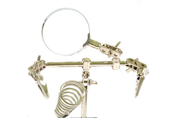 Clamp with magnifying glass and clip