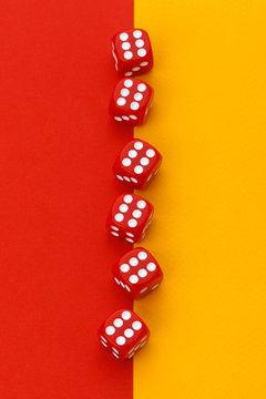 Gaming dice on color background