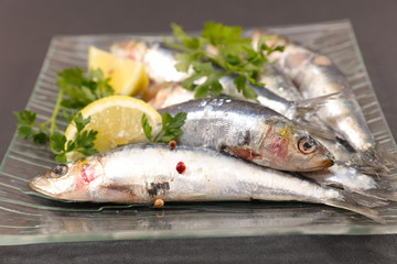 sardine fish with lemon and parsley