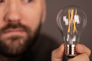 idea lamp concept in hand