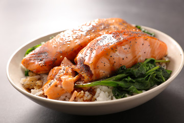 salmon fish with rice, spinach and sauce teriyaki