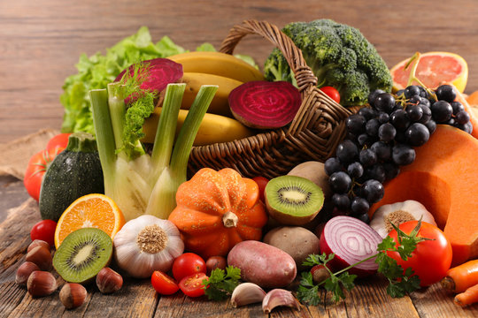 fruit and vegetable on wood background