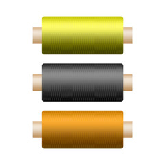 Three colored coils with thread to repair clothing on a white background