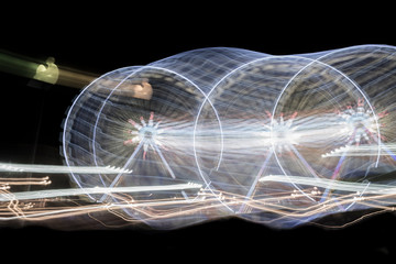 Many Ferris Wheel in Long Exposure in France.