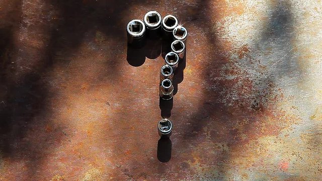 question mark construction tool metal rusty background tree shadow nobody hd footage 