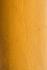 Abstract yellow wall as background