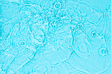 Blue water texture background on the noon sunlight.  