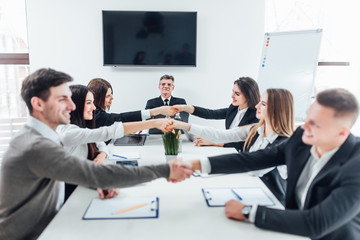 Handshake business partners agree to contract Real Estate Venture International trade.