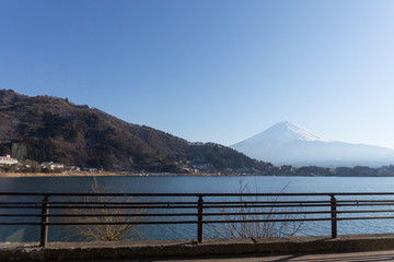 Fuji mountain view take through glass of bus