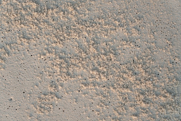 Fototapeta na wymiar beach texture of sand with holes