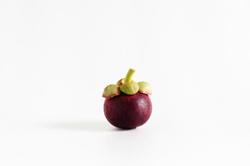 Fresh Thai mangosteens half cut isloated on white background