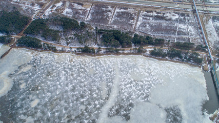 forest border with frozen lake