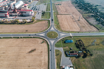 four-way road ring between fields