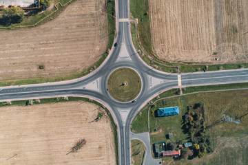 four-way road ring between fields