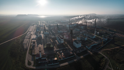 production of potash fertilizers, smoke from pipes creates pollution. shot by drone