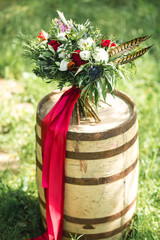 Bridal bouquets on a barrel