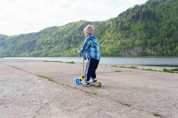 boy on scooter