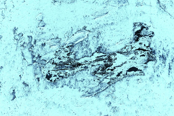 Vintage blue background. Rough painted wall of sapphire color. Imperfect plane of blue colored. Uneven old decorative toned backdrop of cyan tint. Texture of sapphirine hue. Ornamental stony surface.