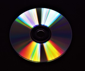 Single CD DVD disc closeup black background