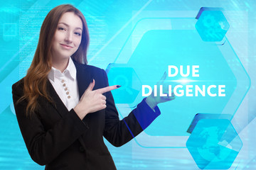 The concept of business, technology, the Internet and the network. A young entrepreneur working on a virtual screen of the future and sees the inscription: Due diligence