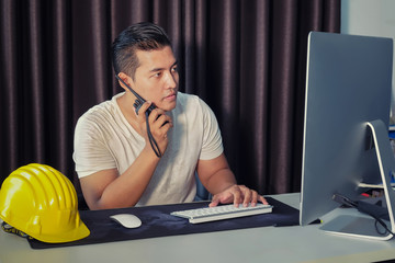 Young Asian engineers are serious and busy