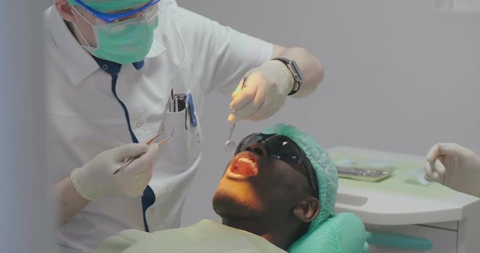 treatment of black patient teeth is successful
