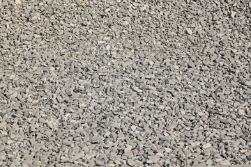 textures of a small gray stone of crushed stone