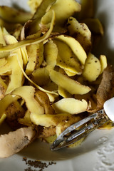 Potato peeler and potato peels.