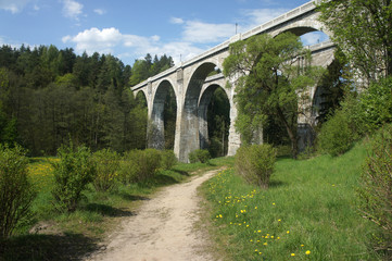 Fototapeta na wymiar View of the highest in Poland double-track railway viaduct in Stanchiki.