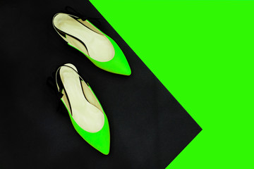 Neon green -black summer shoes. Summer girl Outfit, Luxury Party shoes. Minimal fashionable concep. Fashion accessories. Summer outfit