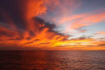 Naklejka na ściany i meble sunset over the sea canarian island