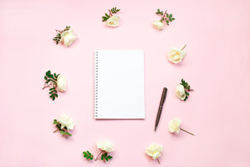 Feminine home office workspace. Notebook with copy space. Flat lay, magazines, social media, top view. Beauty business blog concept Wedding to do list