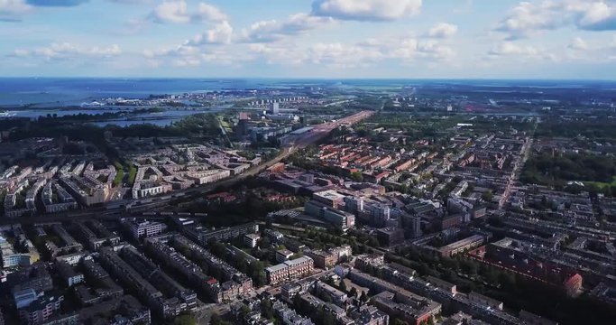 Amsterdam, capital of Netherlands. Wide panoramic Aerial view of beautiful European city