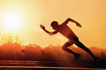 Man fitness silhouette sunrise jogging workout wellness concept. - Image