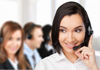 Young woman  with headphones, call center or support concept