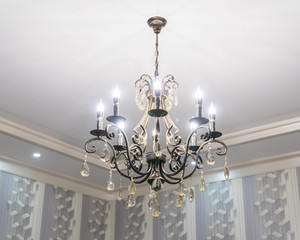 luxurious chandelier with crystal hanging on the ceiling