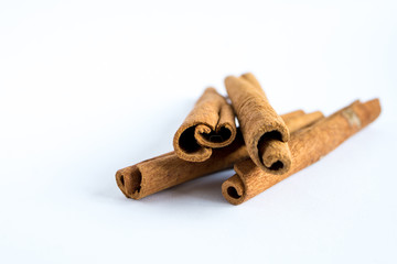 cinnamon sticks on white background