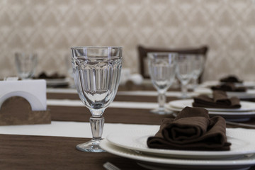serving banquet table in a luxurious restaurant in brown and white style