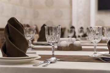 serving banquet table in a luxurious restaurant in brown and white style