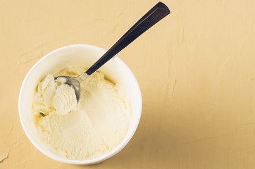 ice cream. ice cream in jar on a table. Spoon on ice cream. Sweet dessert. Top view