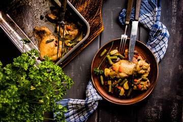 Prepared for baking chicken meat with vegetables.