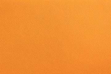 The original texture of the skin. Furniture upholstery orange, close-up