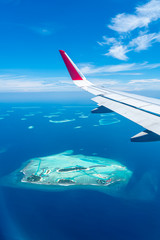 Maldives islands top view from airplane window © topntp