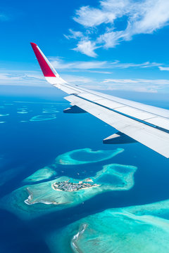 Maldives islands top view from airplane window