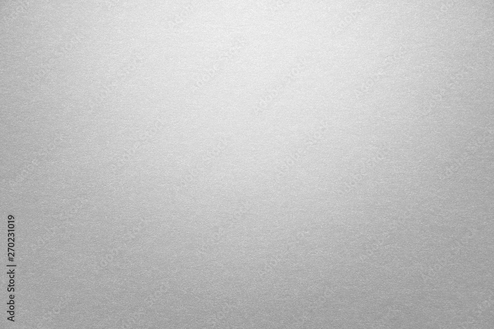 Wall mural abstract grey glossy paper texture background or backdrop. empty gray cardboard or shiny paperboard 