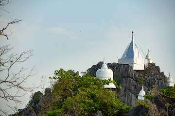 Wat chaloem phrachomklao rachanuson that the tample and pagoda on rock mountain in sunshine...