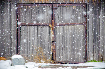 large snowflakes on the background of wooden doors
