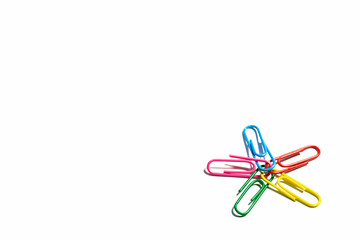 Colorful paper clips on white background.