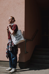 Red haired hipster man going to walk